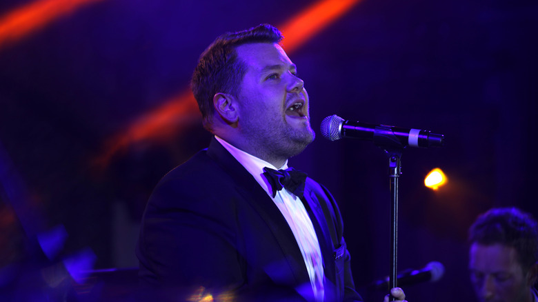 James Corden sings onstage at amfAR Los Angeles 2017 at Ron Burkle's Green Acres Estate on October 13, 2017.