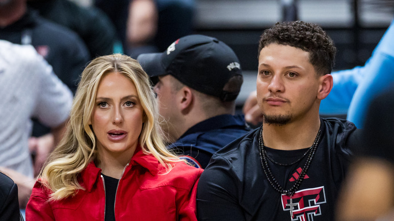 Brittany Mahomes and Patrick Mahomes at a sporting event