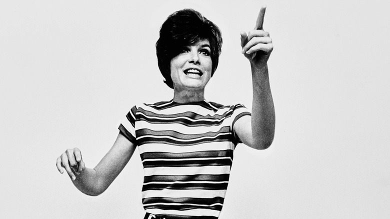 Katharine Ross posing for cameras