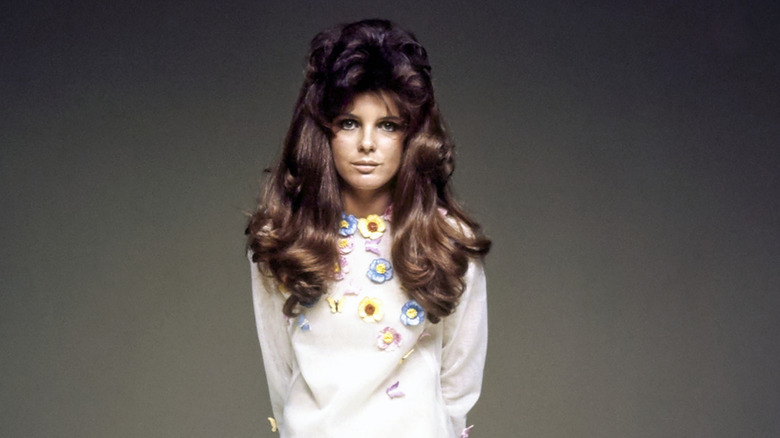 Katharine Ross posing for cameras