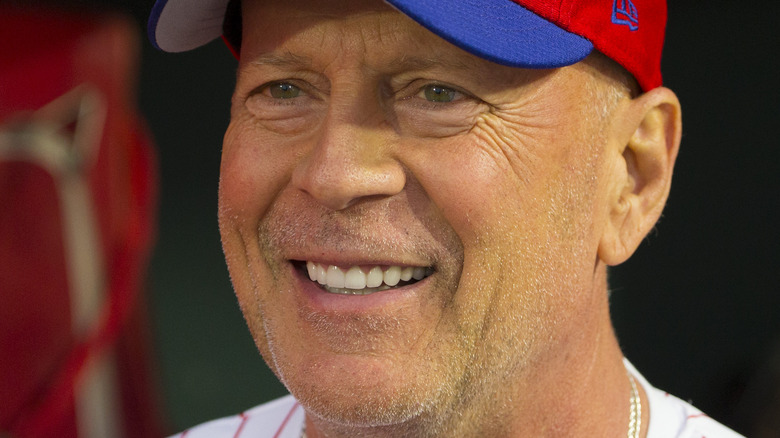 Bruce Willis in baseball cap