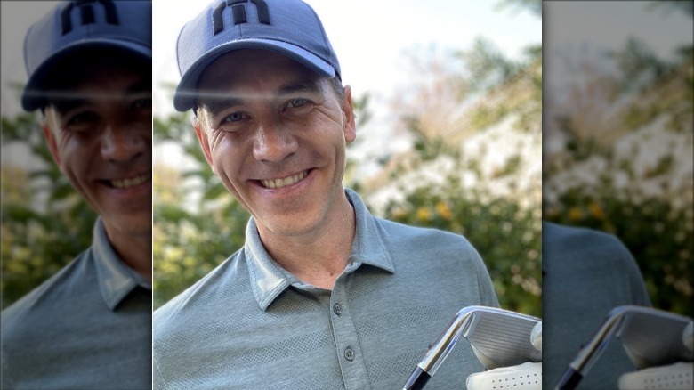 Brian Dietzen poses in golf gear