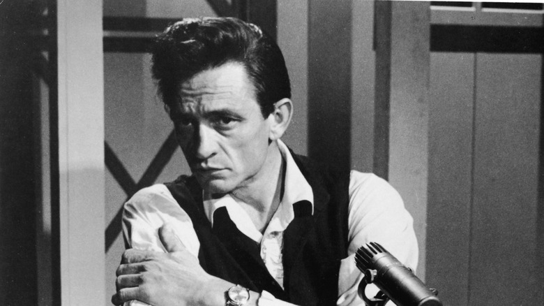 portrait of Johnny Cash with a microphone