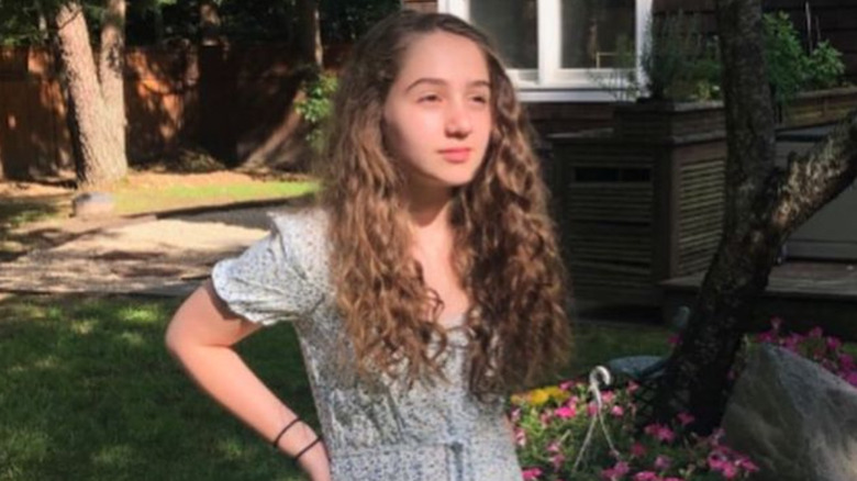 Laurel Griggs posing on her 13th birthday