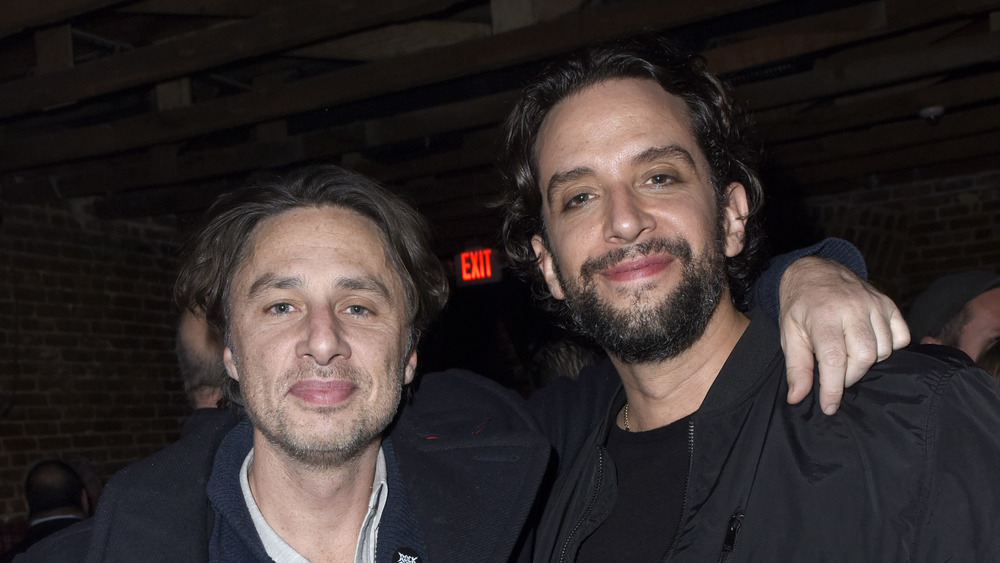 Zach Braff and Nick Cordero with their arms around one another