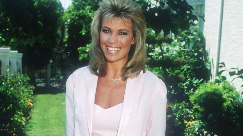 Vanna White smiles outside