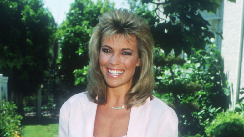 Vanna White smiles outside