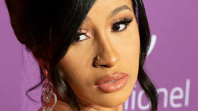 Cardi B with serious expression on the red carpet