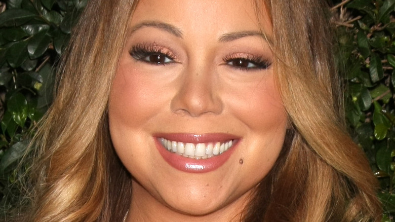 Mariah Carey smiles