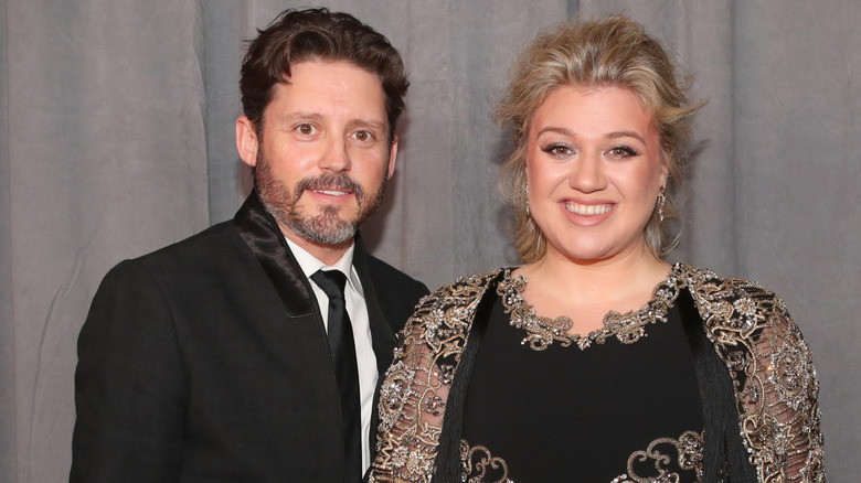 Brandon Blackstock and Kelly Clarkson posing