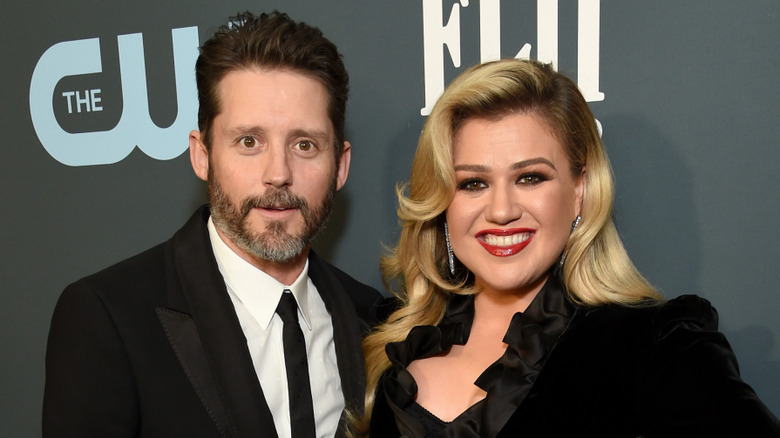Brandon Blackstock and Kelly Clarkson posing