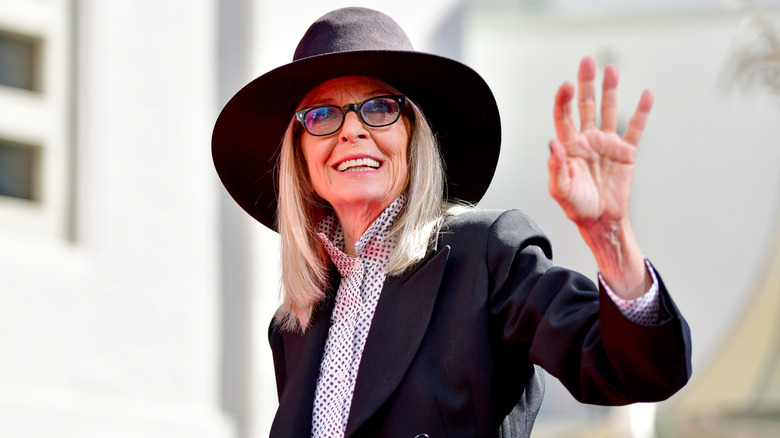 Diane Keaton waving while attending the Handprint and Footprint in Cement Ceremony