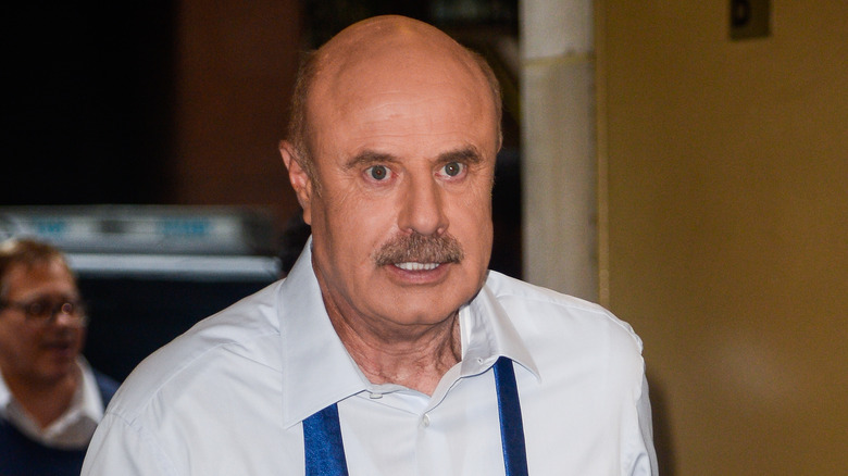 Dr. Phil McGraw in a white shirt