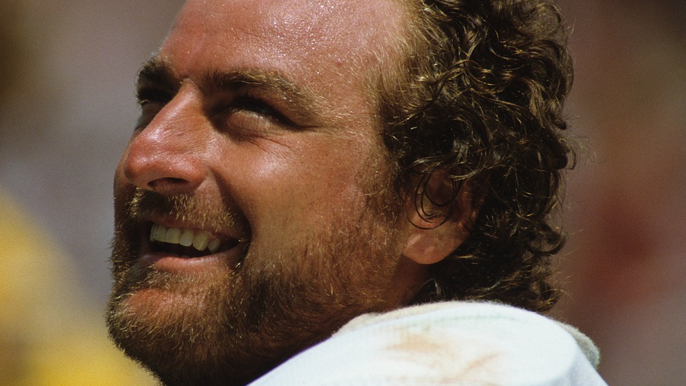 Matuszak smiling playing football
