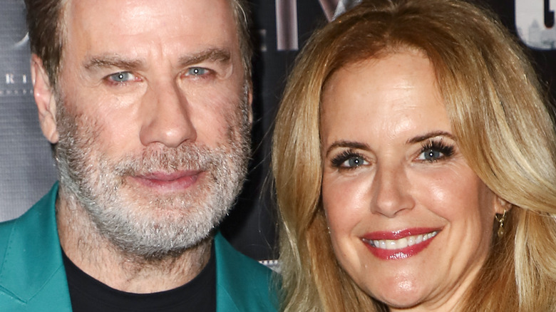 John Travolta and Kelly Preston smiling