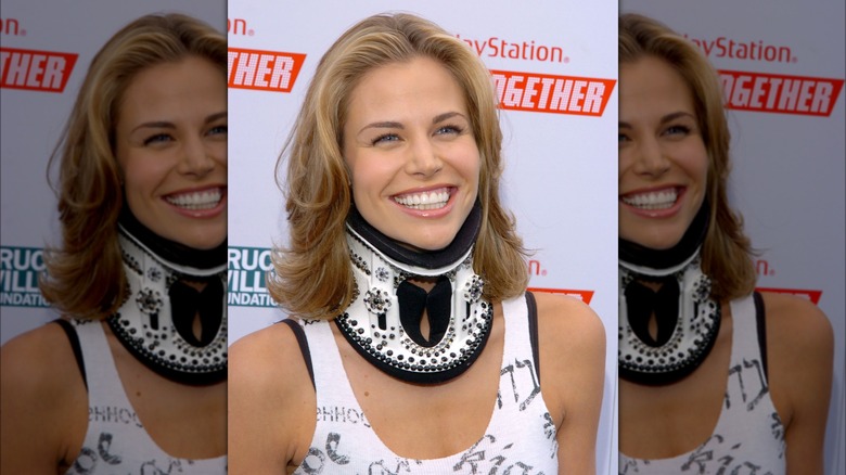 Brooke Burns wearing neck brace
