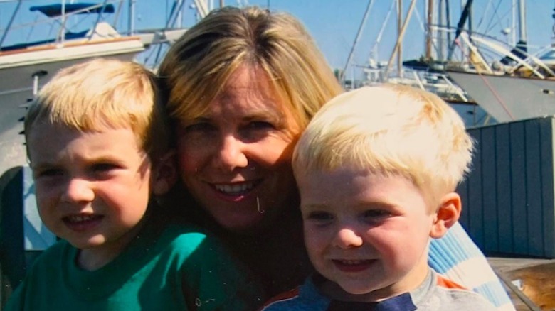 Young Alex Warren with his mother and a sibling