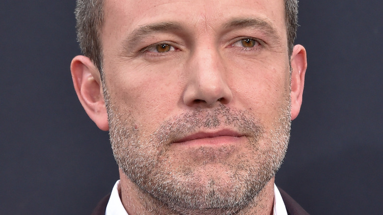 Ben Affleck poses in a suit