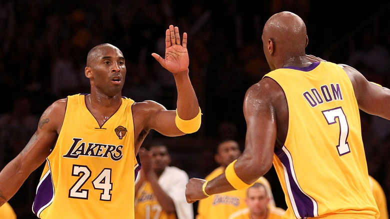 Kobe Bryant high-fiving Lamar Odom
