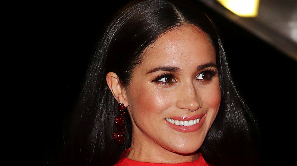 Meghan Markle grinning