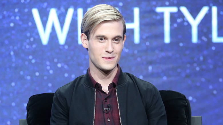 Tyler Henry sitting down serious