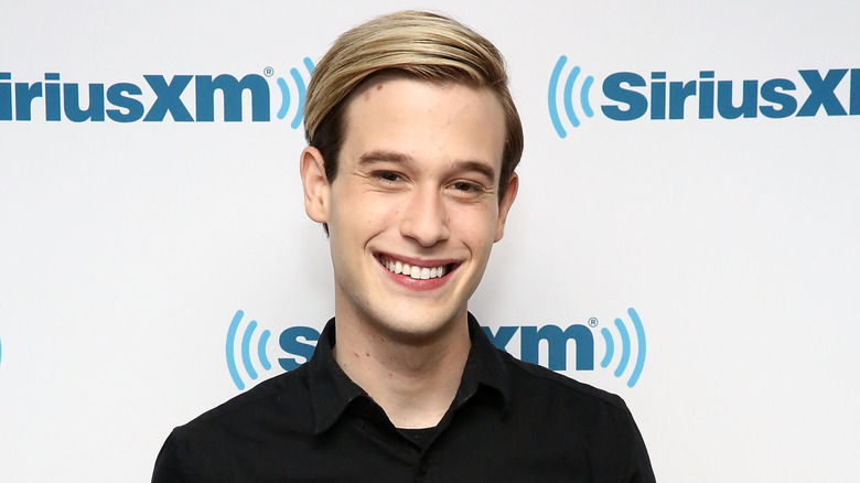 Tyler Henry smiling white background
