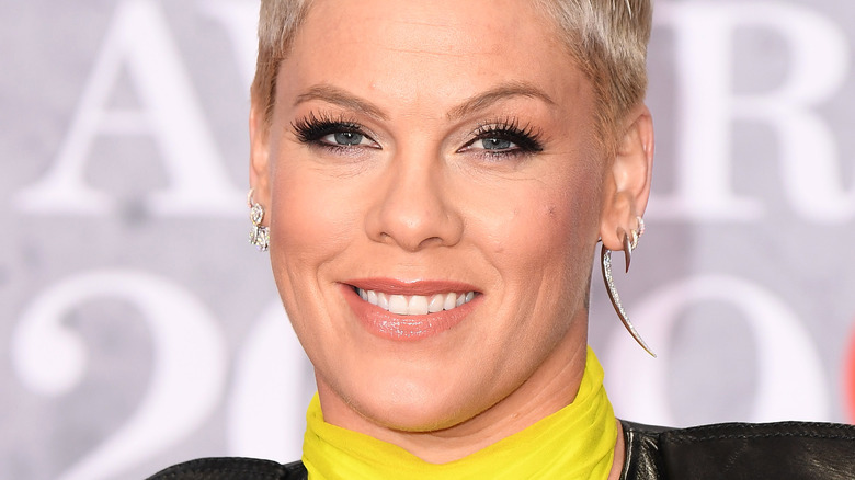 P!nk smiling at a red carpet event