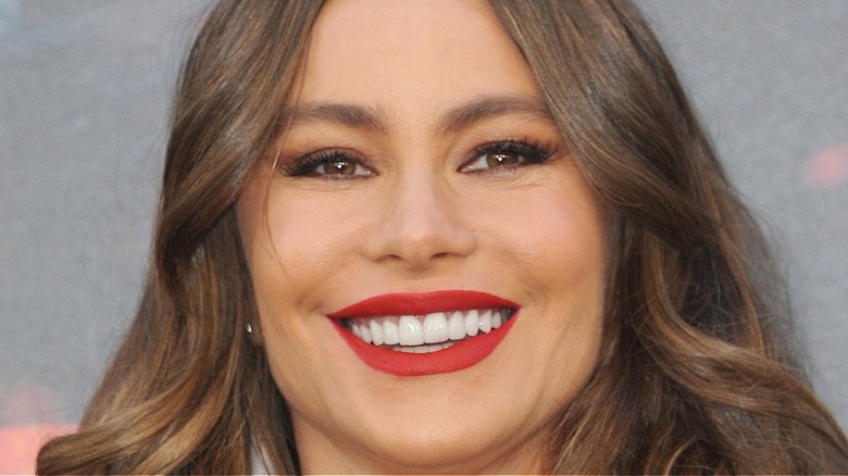 Sofia Vergara smiling with red lip