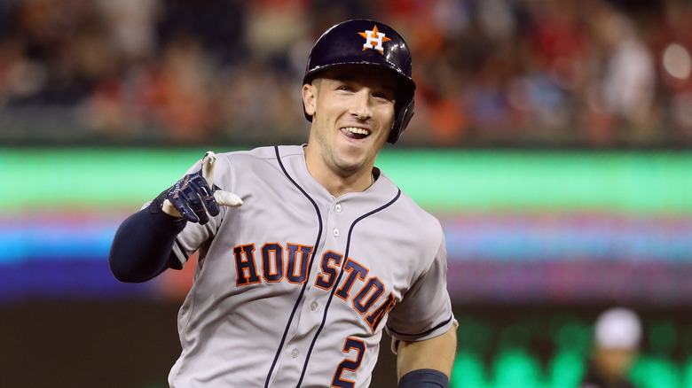 Alex Bregman pointing at camera, smiling