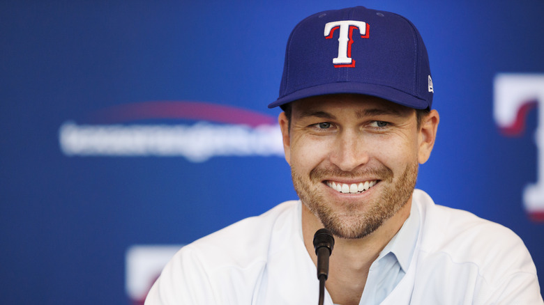 Jacob deGrom smiling at a microphone