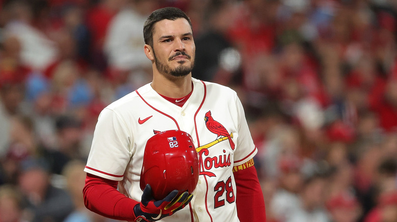Nolan Arenado in uniform, holding hat