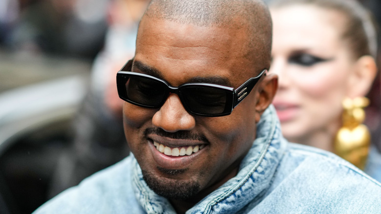 Ye is seen, outside Kenzo, during Paris Fashion Week