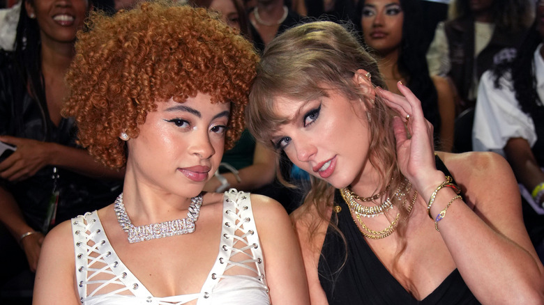 Ice Spice and Taylor Swift posing