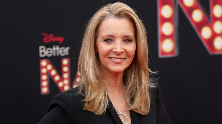 Lisa Kudrow poses at an event