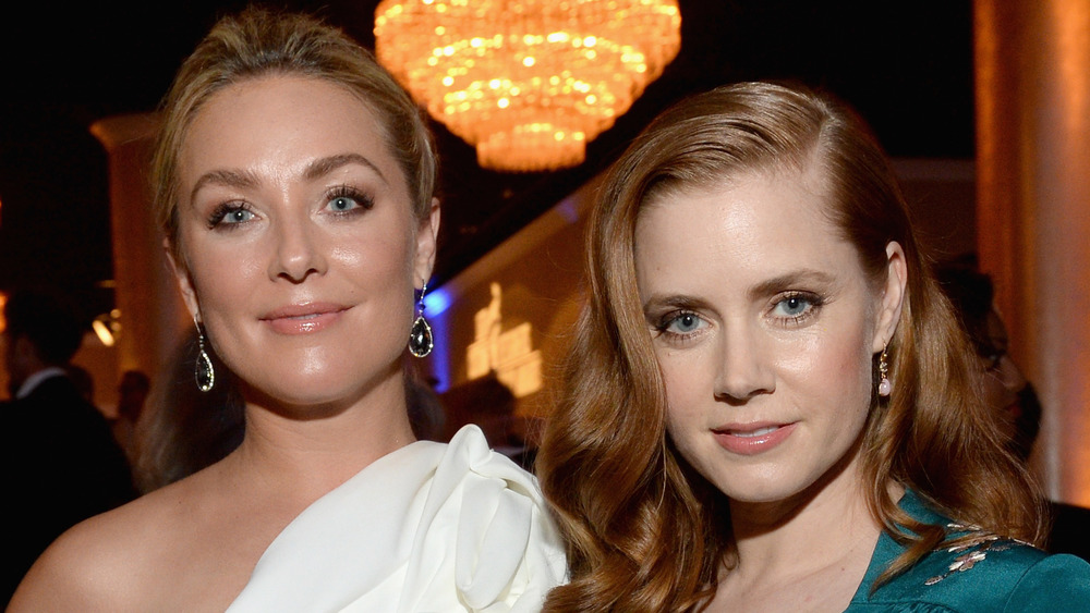 Elisabeth Rohm and Amy Adams posing for camera