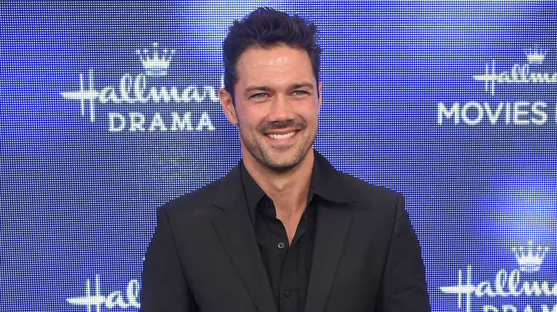 Ryan Paevey smiling