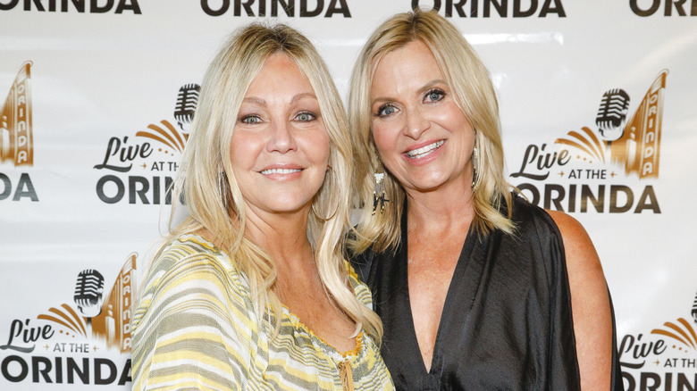 Heather Locklear and Kristine Carlson pose on the red carpet together