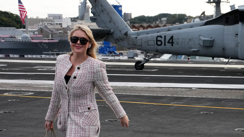 White House press secretary Karoline Leavitt arriving with U.S. President Donald Trump aboard USS George Washington at Fleet Activities Yokosuka