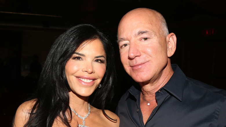 Jeff Bezos and Lauren Sánchez Bezos pose together in 2024