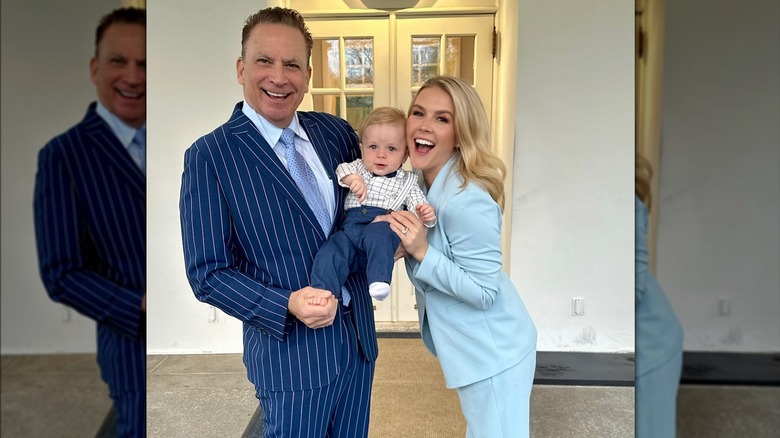 Karoline Leavitt smiling with her husband and baby