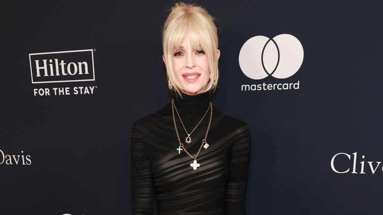 Kelly Osbourne posing on the red carpet in 2026.