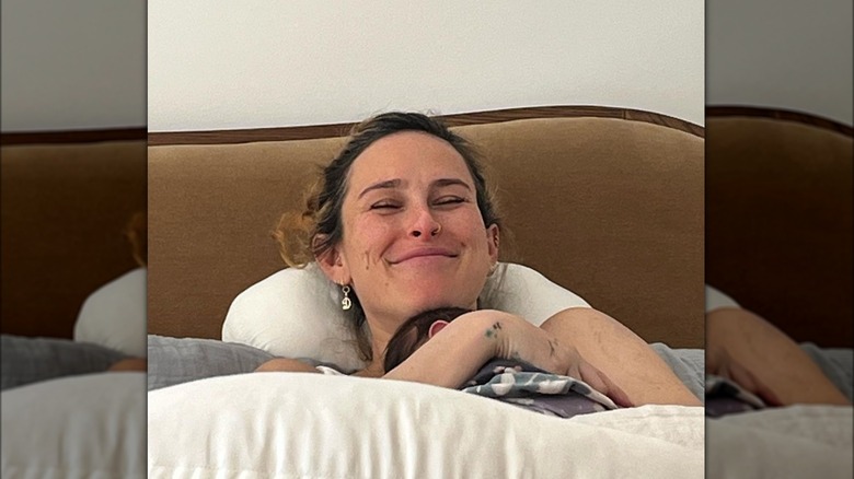 Rumer Willis hugs her baby