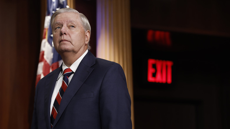 Lindsey Graham listens during 2023 news conference