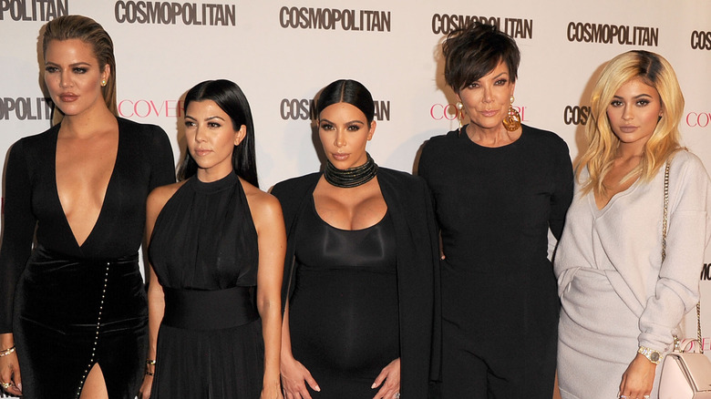 Kris Jenner posing with daughters