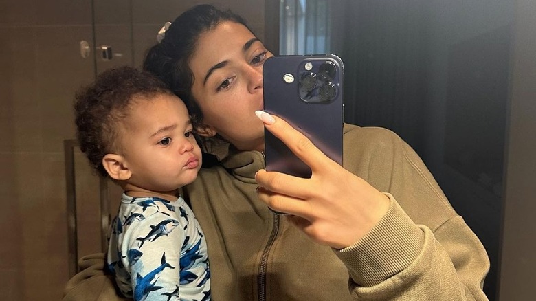 Kylie Jenner taking mirror selfie with Aire