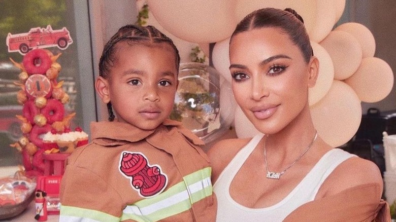 Kim Kardashian holding Psalm West