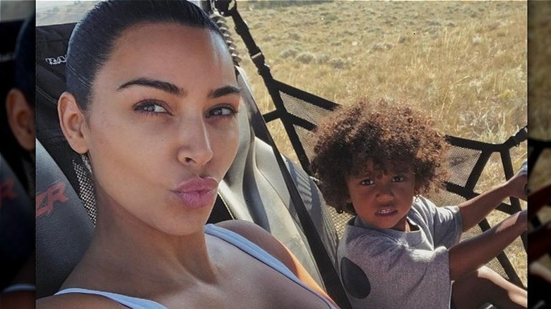 Kim Kardashian, Saint West in buggy