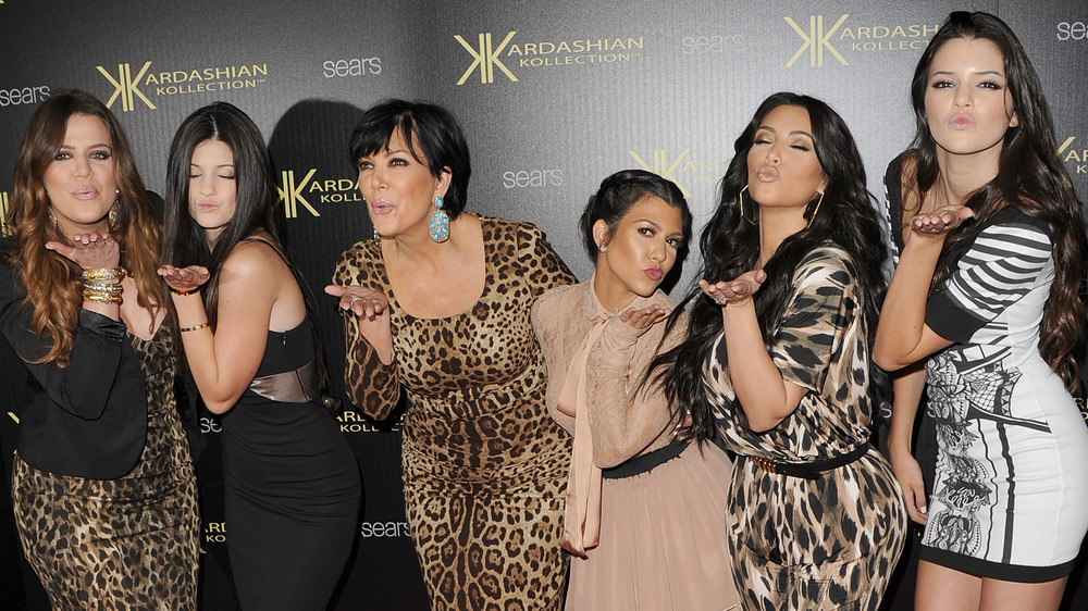 Kardashian-Jenner family blowing kisses