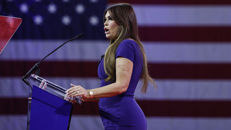 Side view of Kimberly Guilfoyle behind podium