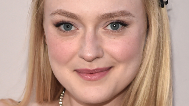 Dakota Fanning smirking